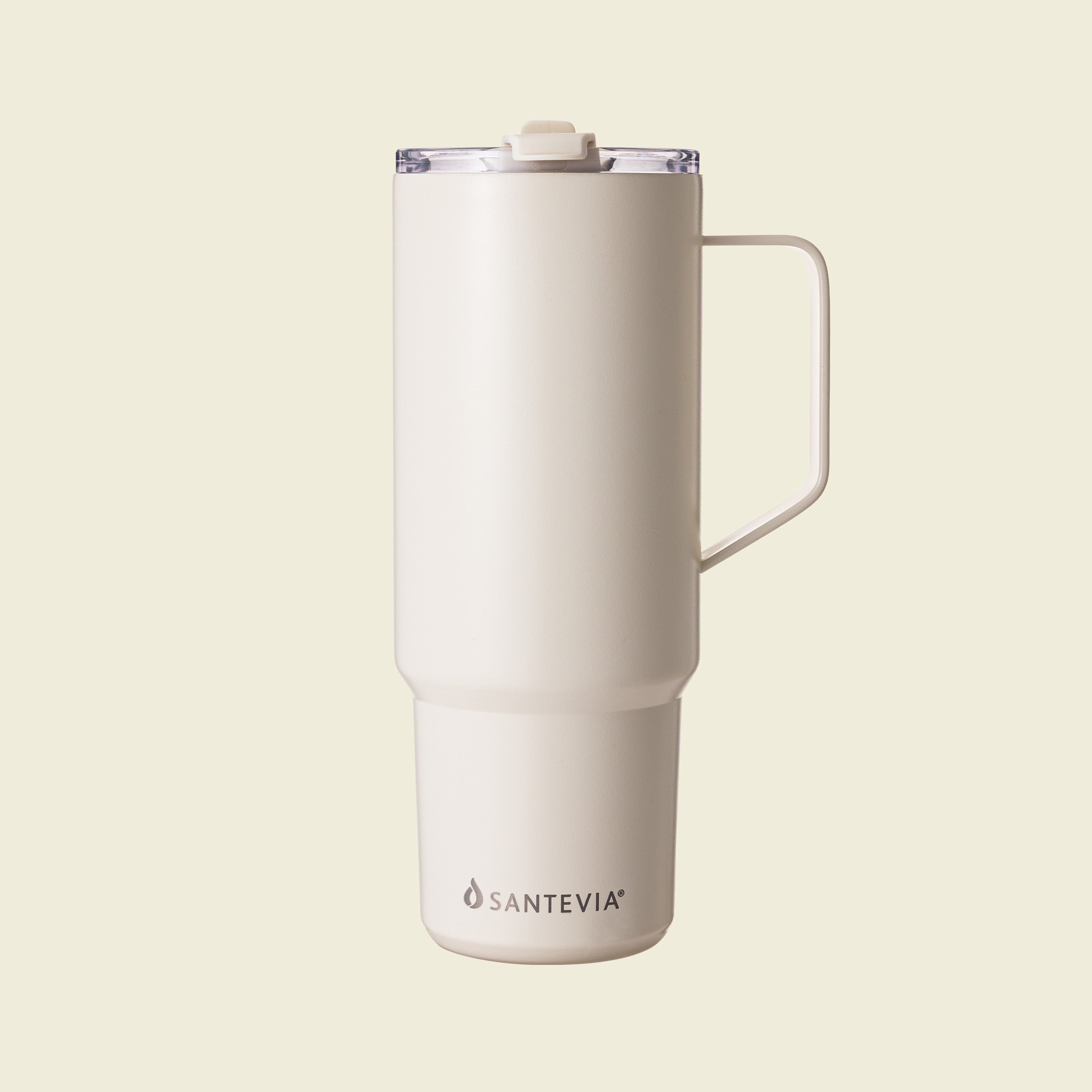 White insulated tumbler with handle on a beige background, featuring the Santevia brand.